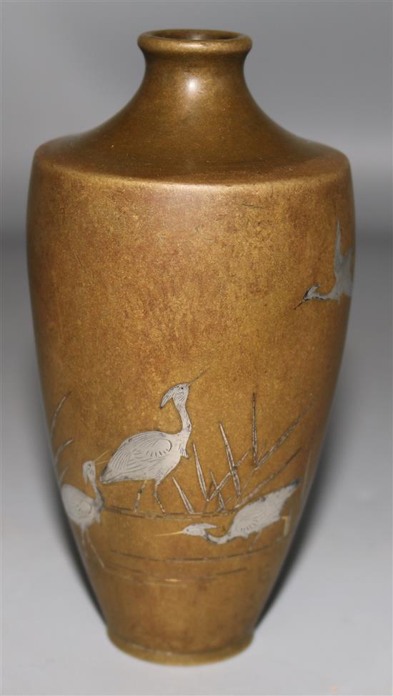 A Japanese bronze and silver inlaid vase, signed